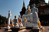 Ayutthaya, Thailand. Wat Yai Chai Mongkhon, statues group of Buddha with disciples.